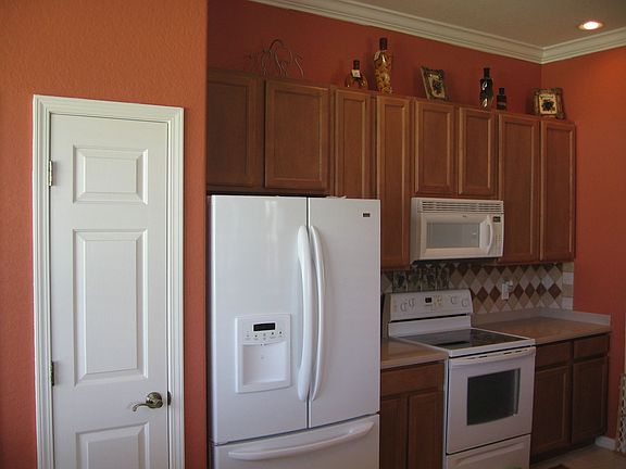 42" wood cabinets and appliances included