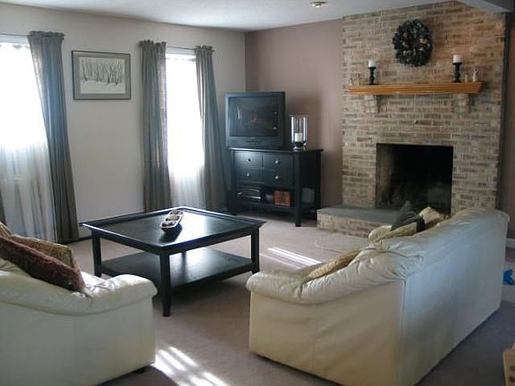 Family/living room with fireplace.