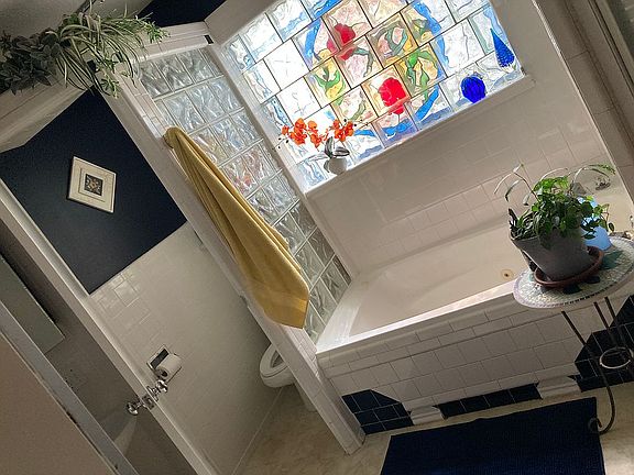 Spa tub,shower,toilet,sinks