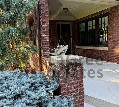 covered front porch and swing