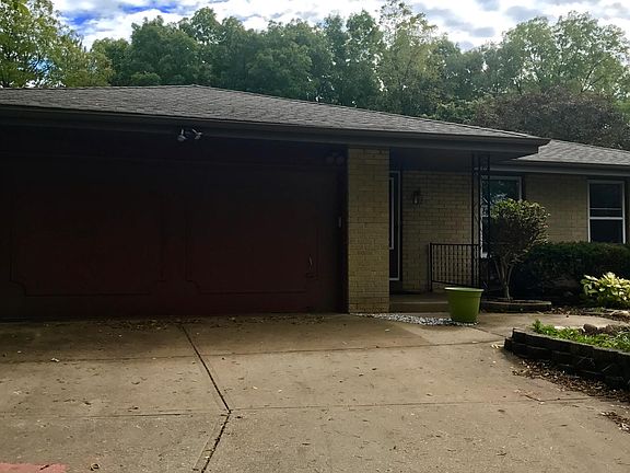 House front view from driveway.