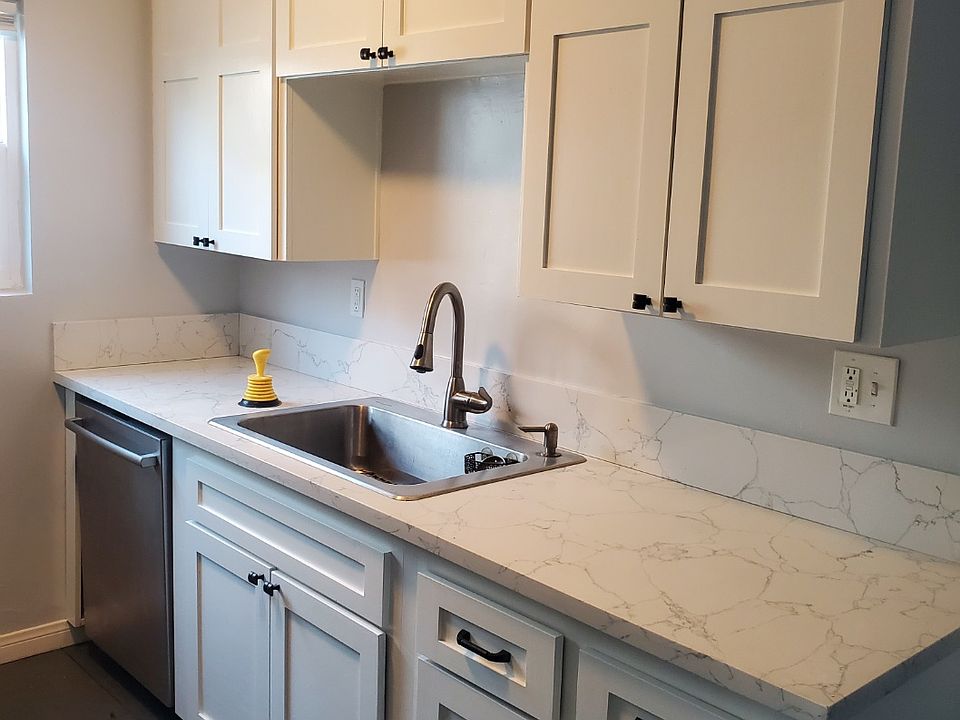 updated kitchen w solid countertop