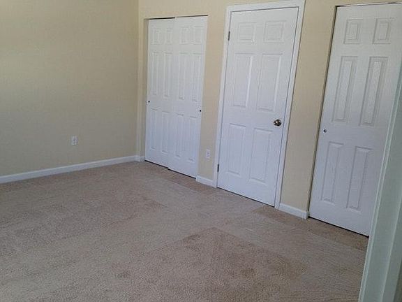 Master bedroom with his/her closets