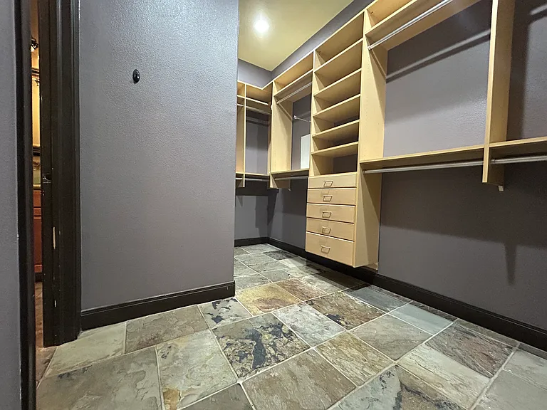 master walk-in closet (left side)