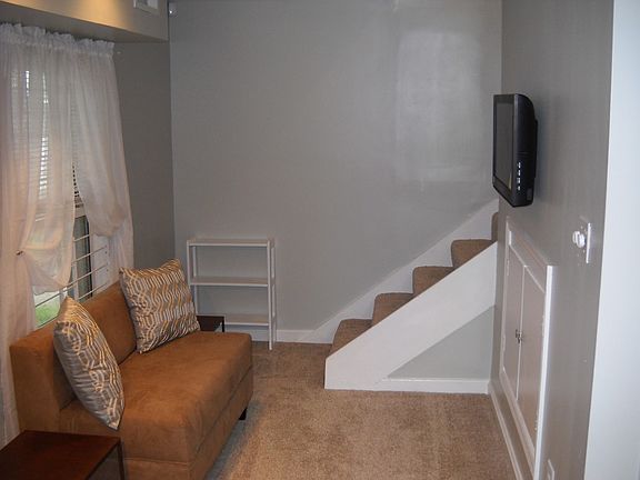 Furnished living room with flatscreen TV