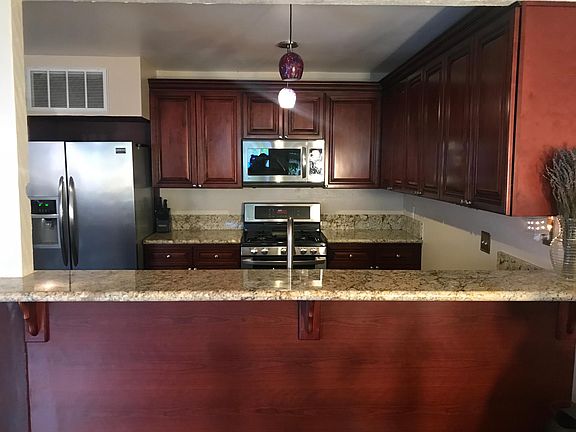 3rd image of 7924 Woodman Ave Unit 38