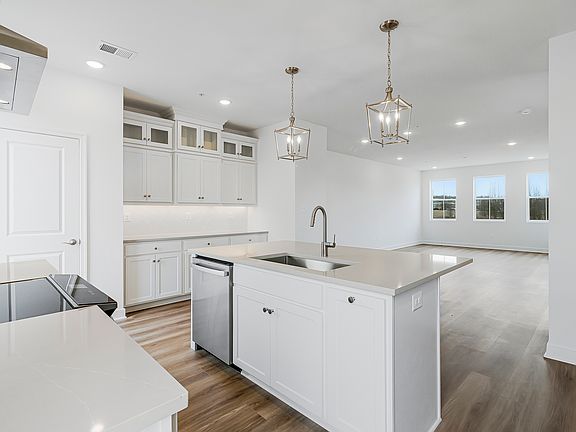 Kitchen with upper glass cabinets