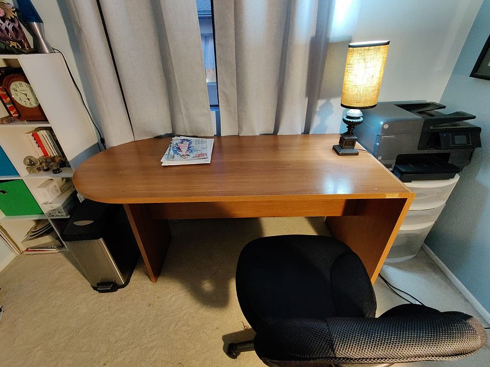 Desk remains in the room for the next occupant to use