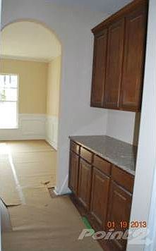 butlers pantry with wood laminate floors
