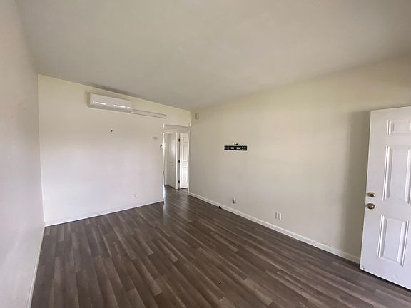 Living room with newer Split AC system.