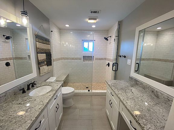 Huge glass shower w/bench