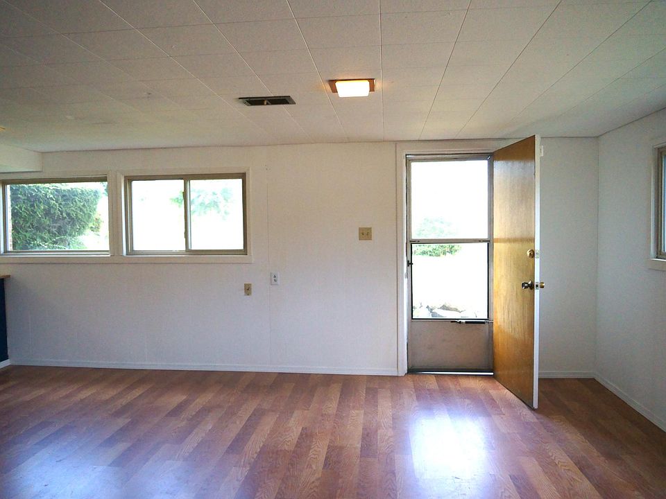 Private entrance enters into brightly lit, large living area