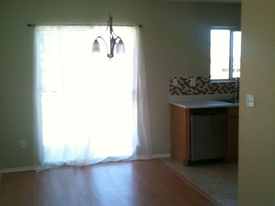 sliding glass door fills dining room w/ light