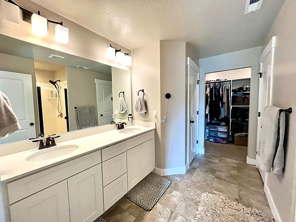 Master bathroom with walk-in closet