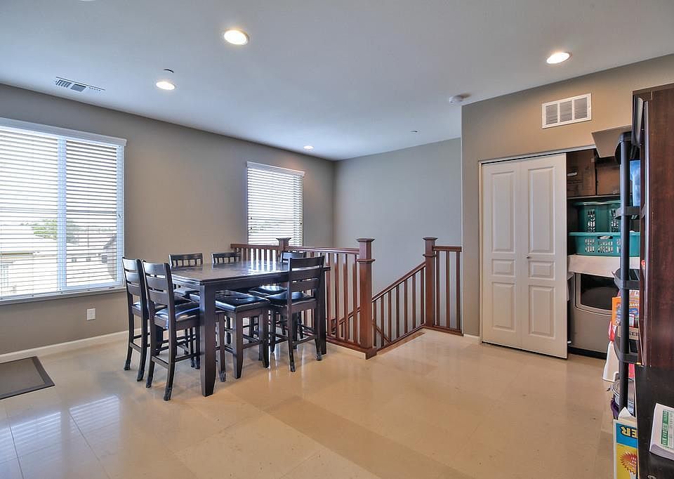 Dining Room & Washer/Dryer Unit (Right)