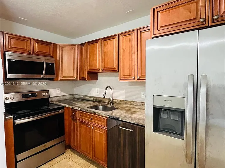7701 SW 10th Ct #1A — Photo 1