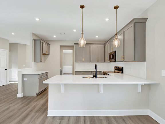 Oscar Mulberry Kitchen Island View - Ernest Homes