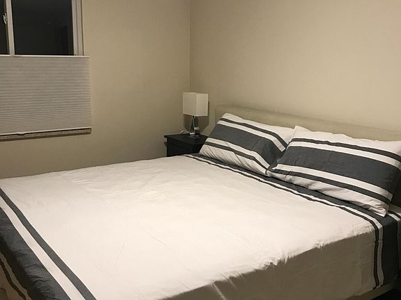 King size bedroom in walkout basement w/bath attached. Shower only.