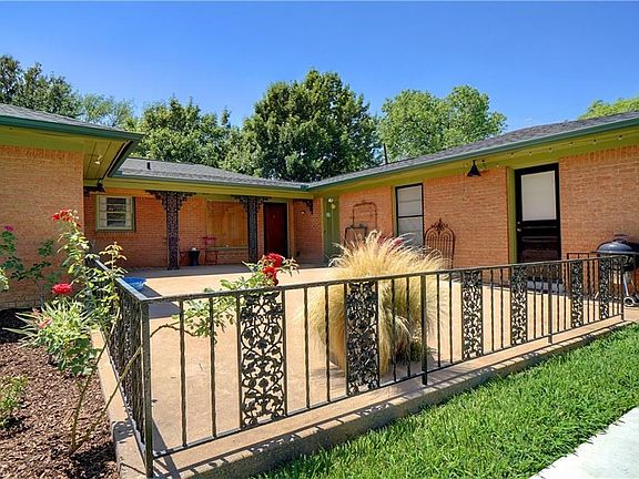 Wonderful patio with original iron fencing