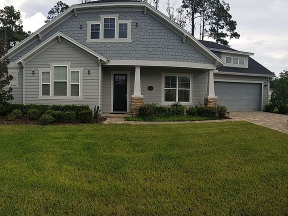 Front Yard w/ Paver Driveway