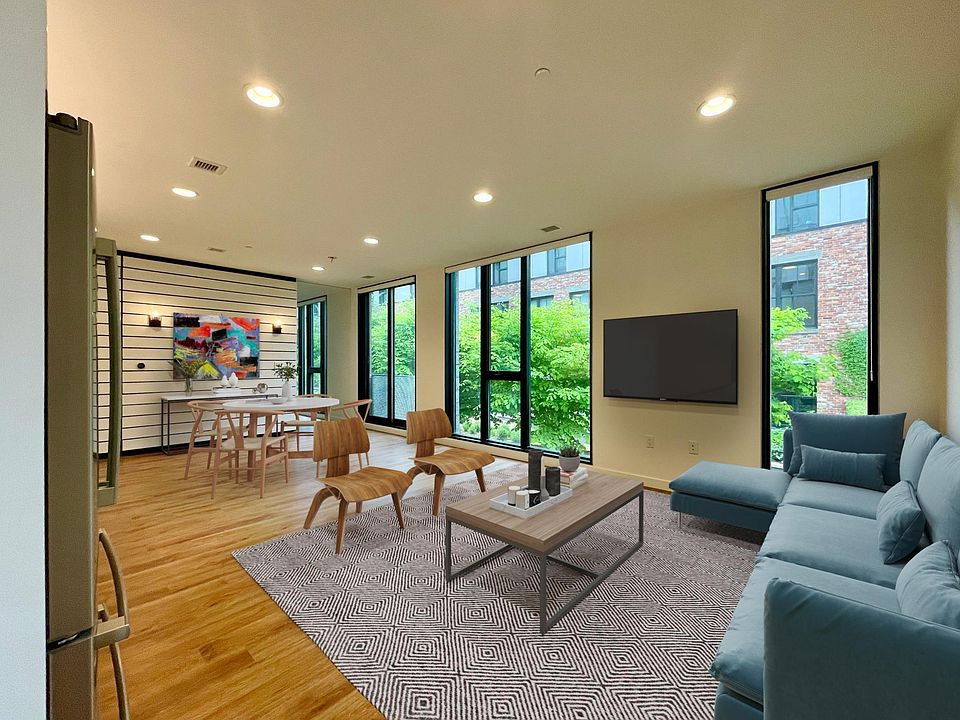 Living / dining room with view of courtyard