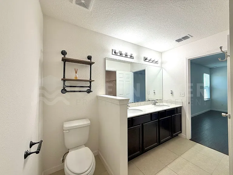 8704 Lake George Cir W — Photo 22