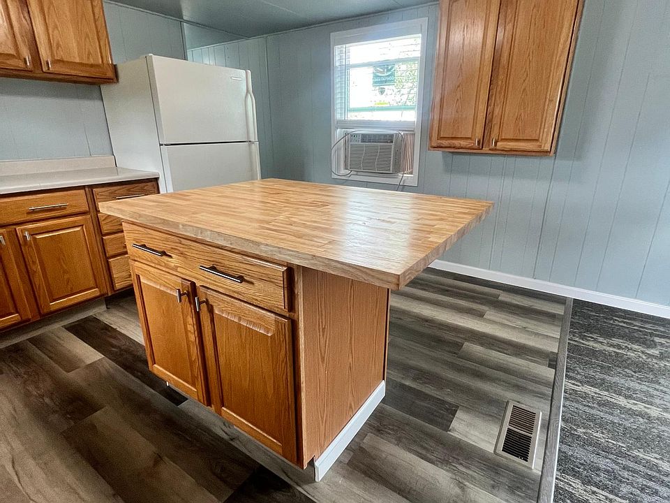 kitchen with butcher block bar seating
