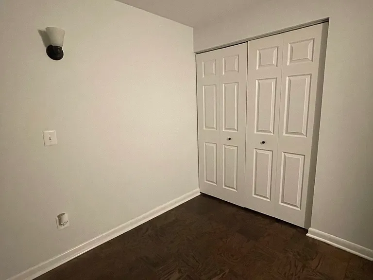 Main bedroom, double closet doors.