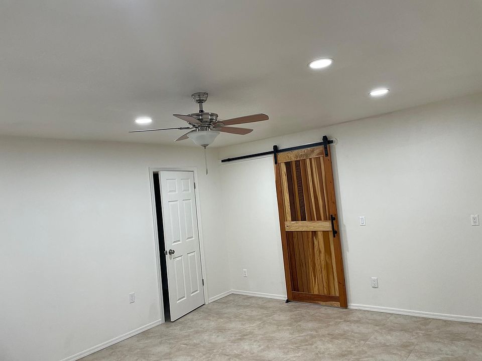 Large bedroom off of living room with walk in closet