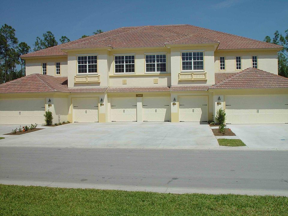 First floor Of a 4 unit condo-2 car garage, beach chairs and coolers
