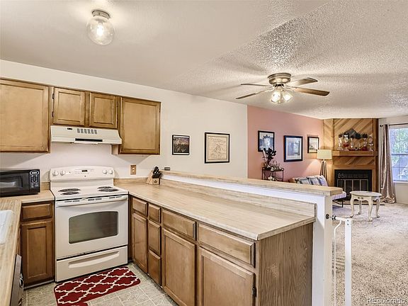 5th image of 9697 W Chatfield Ave Unit D
