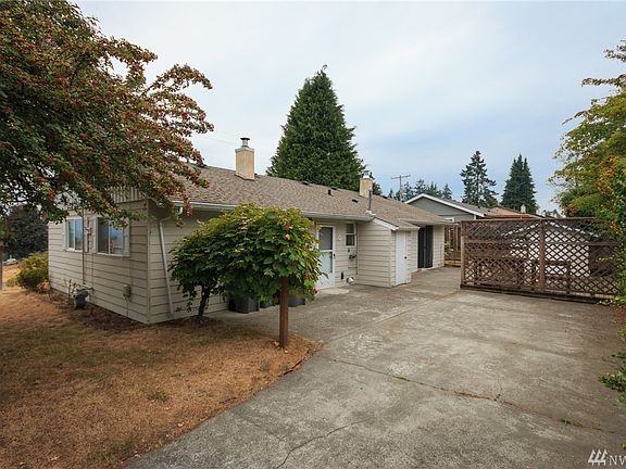Back of Home and Private Driveway off on 33rd St.