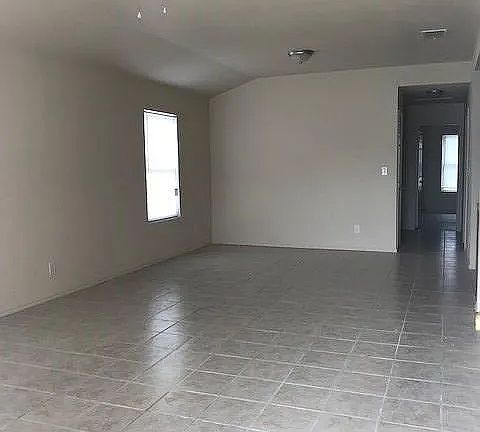 Living & Dining Space Front Entry. Bedrooms and Bathrooms in the back hallway.