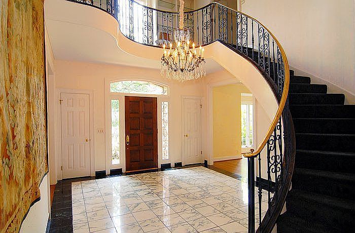 Elegant Entry w/Curved Staircase