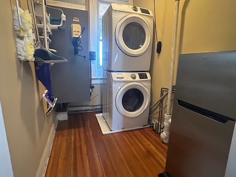 Private Laundry room with ample storage space