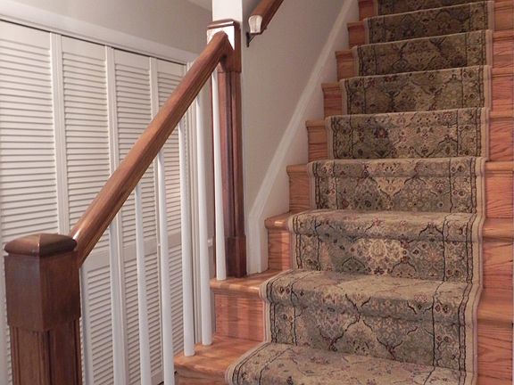 tile foyer with guest closet