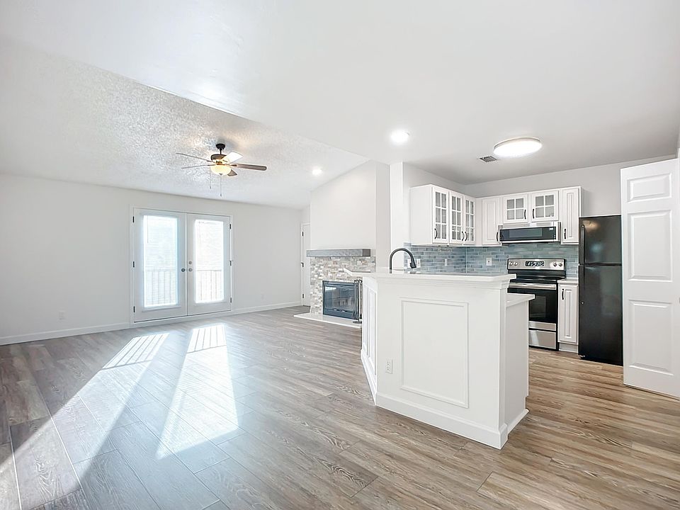 Living room and Kitchen (Shot from Dining area)