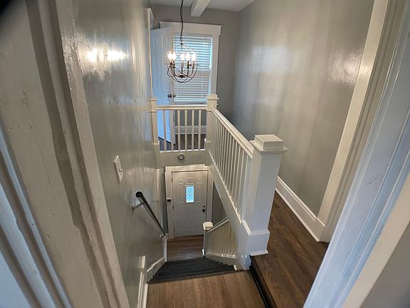 Entrance with walkway to back bedroom