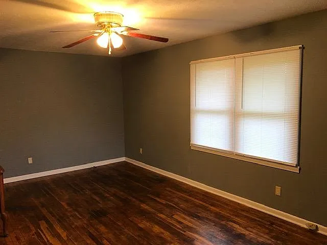 Living Room. Hard wood floors. Double window.