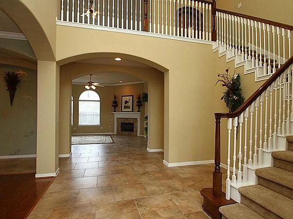 From the entry looking into the home.  Note the gracious curved staircase.