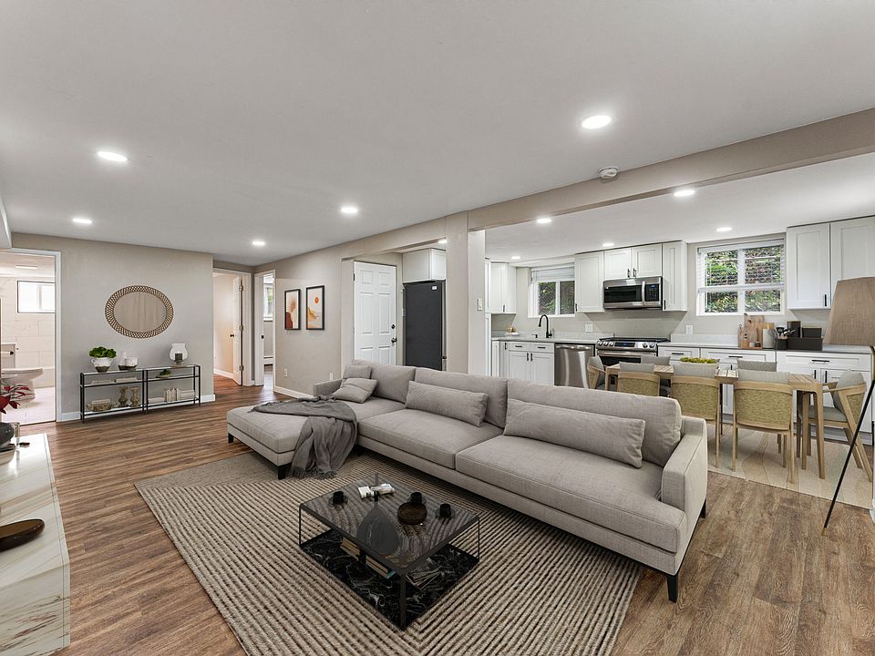 Spacious open concept living room and large remodeled kitchen