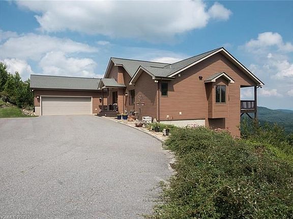 Large flat parking, easy turn around in driveway plus a large 2 car garage.