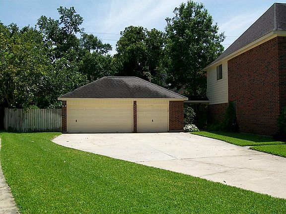 Plenty of parking  space. Room for RV or boat storage thru gates to the left of the garage