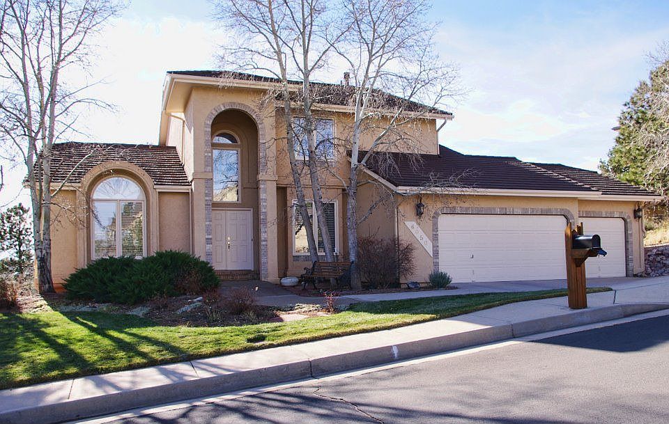 Award winning Parade Home with mountain and city views!  Stucco exterior. 