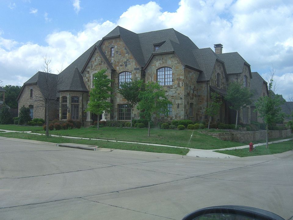 English Stone House with Beautiful Wood Casement Windows
