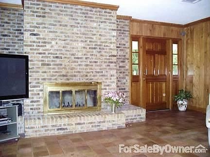 Wood burning fireplace in living room