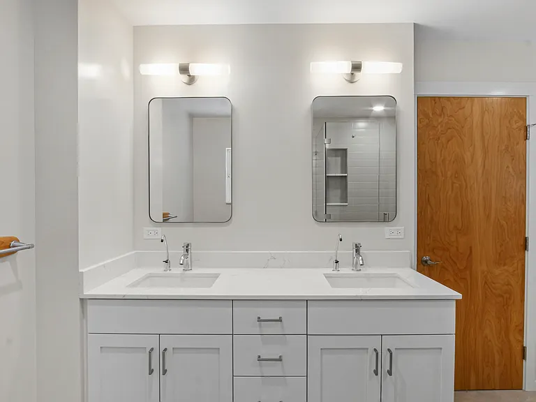 Bathroom with Dual Vanity and Reverse Osmosis Water Access at Sinks
