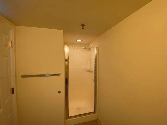 Shower with glass door in bathroom #2