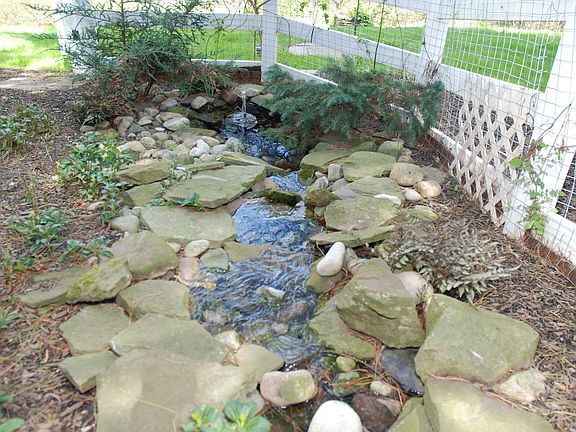 Lovely Water Feature inside fenced area