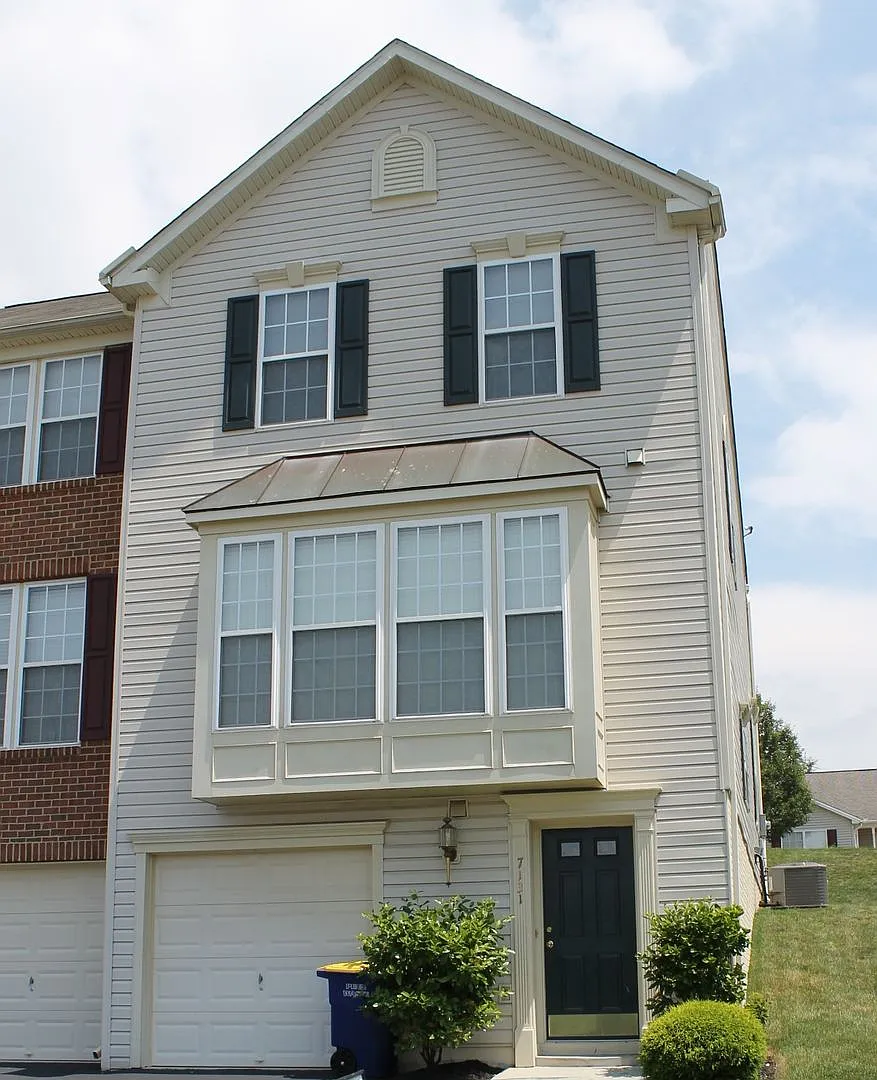 Townhome with Attached Garage — Photo 1